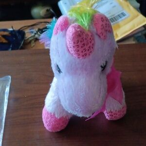 Way to celebrate rainbow unicorn plush